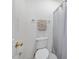 Bathroom featuring toilet, towel rack and shower with curtain at 601 Walcott Way, Cary, NC 27519