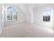 Bedroom featuring carpet, large windows and vaulted ceilings at 601 Walcott Way, Cary, NC 27519