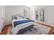 Comfortable bedroom with a cozy rug and natural light at 601 Walcott Way, Cary, NC 27519