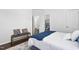 Bedroom with hardwood floors and neutral decor featuring a comfortable bed at 601 Walcott Way, Cary, NC 27519