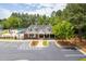 Exterior view of the community clubhouse near the pool and parking at 601 Walcott Way, Cary, NC 27519