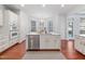 Bright eat-in kitchen features stainless steel appliances and ample counter space at 601 Walcott Way, Cary, NC 27519