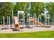This community playground has a tunnel slide, climbing area, and slide for safe playing at 601 Walcott Way, Cary, NC 27519