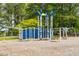 A contemporary style playground for older children with climbing features and swings at 601 Walcott Way, Cary, NC 27519