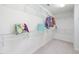 Walk-in closet offering shelving for ample storage at 601 Walcott Way, Cary, NC 27519