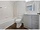 Bathroom features a bathtub and updated vanity at 7271 Shellburne Dr, Raleigh, NC 27612