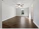 Bedroom featuring ceiling fan and large window view to exterior at 7271 Shellburne Dr, Raleigh, NC 27612