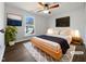 Cozy bedroom with a comfortable bed, natural light, and modern decor at 7271 Shellburne Dr, Raleigh, NC 27612