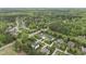 Aerial view of the neighborhood surrounded by mature trees at 1005 Keith Rd, Wake Forest, NC 27587