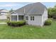 Well-manicured backyard featuring a patio and an outdoor porch at 1005 Keith Rd, Wake Forest, NC 27587