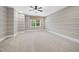 Bedroom with carpet, custom wall trim, and a window with blinds at 1005 Keith Rd, Wake Forest, NC 27587