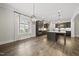 Gourmet kitchen featuring a window, stainless appliances, and island with seating at 1005 Keith Rd, Wake Forest, NC 27587