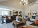 Open-concept living room connects to the kitchen and dining area, enhancing the home's flow at 1005 Keith Rd, Wake Forest, NC 27587
