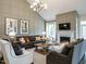 Elegant living room with fireplace, high ceilings, stylish decor, and ample seating at 1005 Keith Rd, Wake Forest, NC 27587