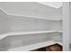 Spacious pantry with white shelving offering ample storage space at 1005 Keith Rd, Wake Forest, NC 27587