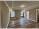 The main bedroom has an abundance of natural light with two large windows at 1063 Fairhaven Dr # 54, Mebane, NC 27302