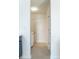 Convenient laundry area with washer and dryer hookups, tile floors, and storage space at 117 Crabwall Ct, Holly Springs, NC 27540