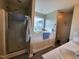 Elegant bathroom showcasing a walk-in shower, soaking tub, and double sinks, providing a spa-like experience at 1317 Justin Oaks Ct, Willow Springs, NC 27592