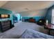 Expansive living area featuring blue walls, carpet, and a flatscreen television at 1317 Justin Oaks Ct, Willow Springs, NC 27592