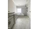 New bathroom showing double vanity and marble tiled shower and tub at 1663 Keith Hills Rd, Lillington, NC 27546