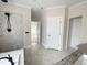 New bathroom showcasing a marble-tiled shower and floors at 1663 Keith Hills Rd, Lillington, NC 27546