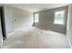 Well-lit bedroom with two windows, perfect for a cozy and relaxing retreat at 1663 Keith Hills Rd, Lillington, NC 27546
