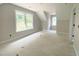 A new room with detailed trim and large windows at 1663 Keith Hills Rd, Lillington, NC 27546