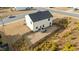 Aerial view of home with fenced backyard and patio area at 17 Donatella Way, Angier, NC 27501