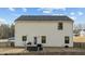 Backyard with a wooden fence, patio, and outdoor seating at 17 Donatella Way, Angier, NC 27501