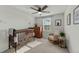 This Bedroom features a dark wood crib, dresser, and rocking chair at 17 Donatella Way, Angier, NC 27501