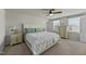 This bedroom features a ceiling fan, dresser, and nightstands at 17 Donatella Way, Angier, NC 27501