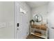 Inviting entryway featuring a console table, round mirror, and stylish decor at 17 Donatella Way, Angier, NC 27501