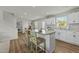 Bright kitchen with stainless steel appliances, granite countertops, and a convenient center island at 17 Donatella Way, Angier, NC 27501