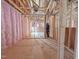 View of the unfinished basement with insulation, framing, and HVAC ducts visible at 1905 Old Bramble Ln # 4, Fuquay Varina, NC 27526