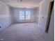 A bright bedroom bathed in natural light from its large window at 1905 Old Bramble Ln # 4, Fuquay Varina, NC 27526