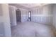 A well-lit bedroom shows large window with a view of the exterior at 1905 Old Bramble Ln # 4, Fuquay Varina, NC 27526