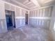 Unfinished bedroom with bare floors and a small window at 1905 Old Bramble Ln # 4, Fuquay Varina, NC 27526