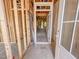 Unfinished entryway showcases the home's framework and a glimpse of the natural light at 1905 Old Bramble Ln # 4, Fuquay Varina, NC 27526