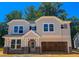 A charming two-story home features a two-car garage and classic design at 1905 Old Bramble Ln # 4, Fuquay Varina, NC 27526