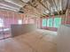 A wide view of the spacious living room during construction with multiple windows at 1905 Old Bramble Ln # 4, Fuquay Varina, NC 27526