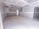 Living room featuring recessed lighting, drywall, and an open doorway in an unfinished new home at 1905 Old Bramble Ln # 4, Fuquay Varina, NC 27526