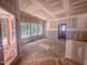 View of a bright unfinished living room with many windows showing the potential of this great space at 1905 Old Bramble Ln # 4, Fuquay Varina, NC 27526