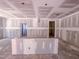 A spacious and unfinished living room at 1905 Old Bramble Ln # 4, Fuquay Varina, NC 27526