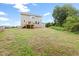 Backyard has a small wooden deck and a house with gray siding at 200 Single Tree Cir, Haw River, NC 27258