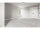 This bedroom features neutral carpet, light gray walls, a ceiling mounted light, and a double door closet at 200 Single Tree Cir, Haw River, NC 27258