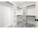 Spacious walk-in closet with built-in shelving and rods at 200 Single Tree Cir, Haw River, NC 27258