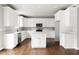Spacious kitchen featuring white cabinets, quartz countertops, and stainless steel appliances at 200 Single Tree Cir, Haw River, NC 27258