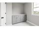 Mudroom features grey cabinets and white countertop at 200 Single Tree Cir, Haw River, NC 27258