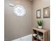 Light-filled entryway with decor, a decorative window and wood-look floors at 2203 Eider Ct # A, Graham, NC 27253