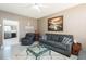 Comfortable living room with neutral colors and view into the adjacent kitchen at 2203 Eider Ct # A, Graham, NC 27253